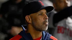 Alex Cora #13 of the Boston Red Sox looks on from the dugout in the sixth inning against the Chicago White Sox at Guaranteed Rate Field.