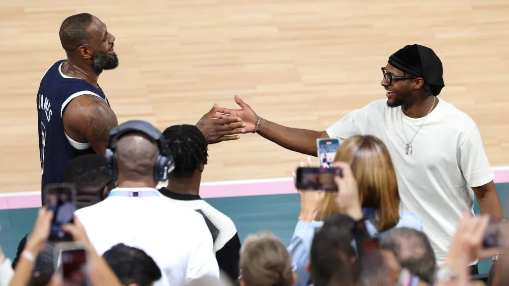 LeBron James #6 of Team United States high fives his son and NBA player Bronny James after Team United States’ victory against Team France during the Men’s Gold Medal game between Team France and Team United States. (Photo by Jamie Squire/Getty Images)