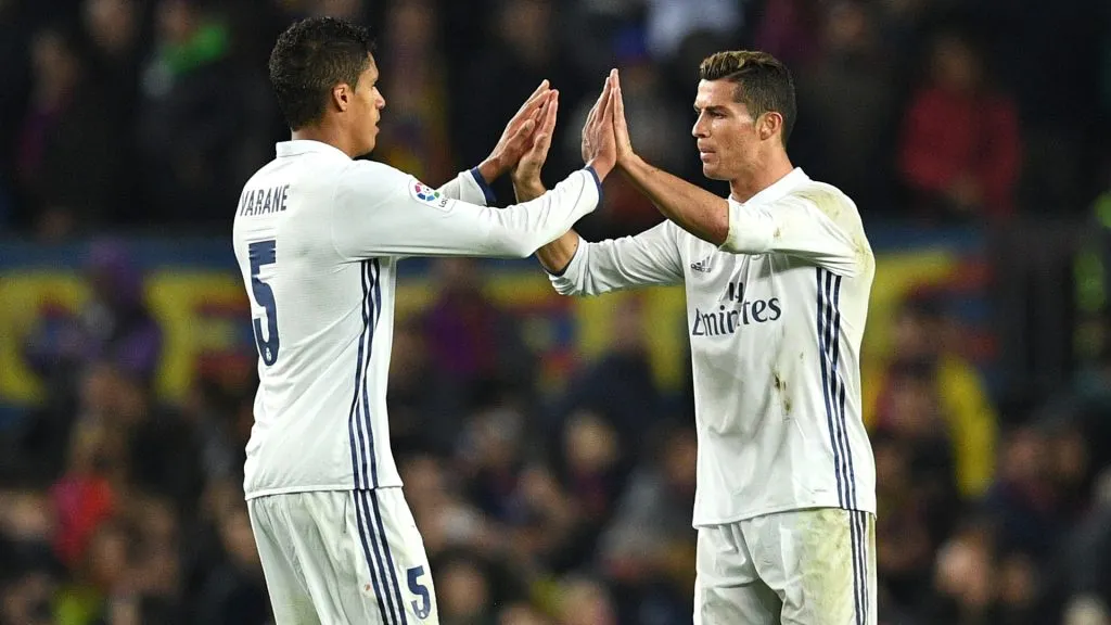 Raphael Varane and Cristiano Ronaldo sharing the field at Real Madrid during the 2016-17 season (Photo by David Ramos/Getty Images)