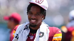 Jayden Daniels #5 of the Washington Commanders looks on against the New York Jets in the first half of the preseason game against at MetLife Stadium on August 10, 2024 in East Rutherford, New Jersey.