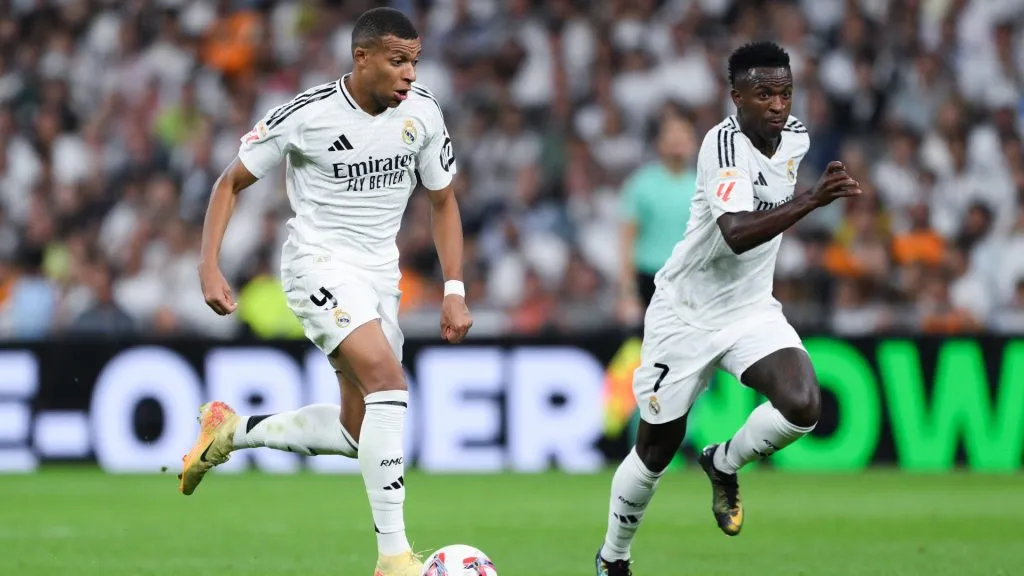 Kylian Mbappé and Vinícius Júnior of Real Madrid run with the ball during the LaLiga match between Real Madrid CF and RCD Espanyol de Barcelona at Estadio Santiago Bernabeu on September 21, 2024 in Madrid, Spain. (Photo by David Ramos/Getty Images)