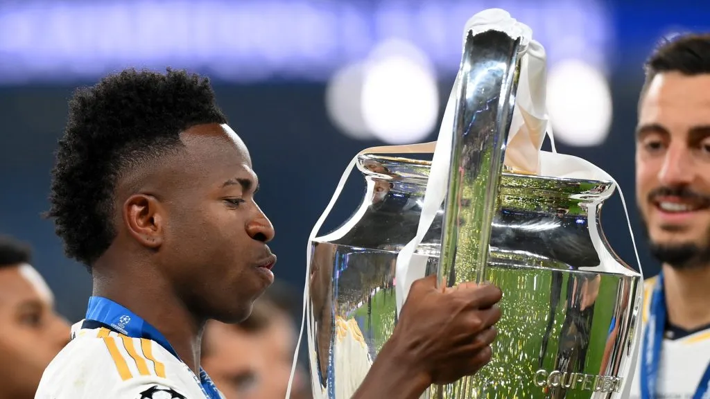 Vinicius Junior of Real Madrid kisses the UEFA Champions League Trophy after his team's victory during the UEFA Champions League 2023/24 Final match between Borussia Dortmund and Real Madrid CF at Wembley Stadium on June 01, 2024 in London, England.
