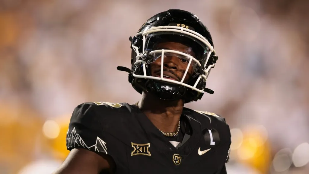Shedeur Sanders #2 of the Colorado Buffaloes celebrates after throwing his 100th career touchdown during the third quarter against the North Dakota State Bison at Folsom Field on August 29, 2024 in Boulder, Colorado.