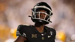 Shedeur Sanders #2 of the Colorado Buffaloes celebrates after throwing his 100th career touchdown during the third quarter against the North Dakota State Bison at Folsom Field on August 29, 2024 in Boulder, Colorado.