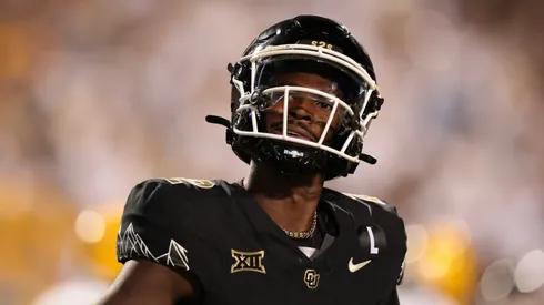 Shedeur Sanders #2 of the Colorado Buffaloes celebrates after throwing his 100th career touchdown during the third quarter against the North Dakota State Bison at Folsom Field on August 29, 2024 in Boulder, Colorado.