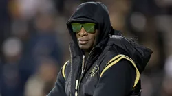 Head coach Deion Sanders of the Colorado Buffaloes walks on the field during pregame against the Stanford Cardinal at Folsom Field on October 13, 2023 in Boulder, Colorado.