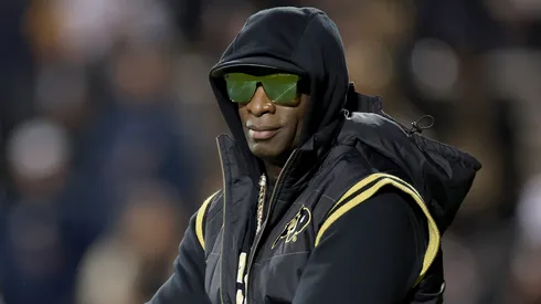 Head coach Deion Sanders of the Colorado Buffaloes walks on the field during pregame against the Stanford Cardinal at Folsom Field on October 13, 2023 in Boulder, Colorado.