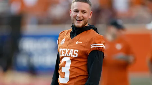 Quinn Ewers #3 of the Texas Longhorns watches players warm up before the game against the Louisiana Monroe Warhawks at Darrell K Royal-Texas Memorial Stadium on September 21, 2024 in Austin, Texas.