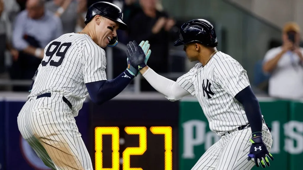 Juan Soto #22 of the New York Yankees celebrates his sixth inning two run home run against the Kansas City Royals with teammate Aaron Judge #99 at Yankee Stadium on September 11, 2024 in New York City. (Photo by Jim McIsaac/Getty Images)
