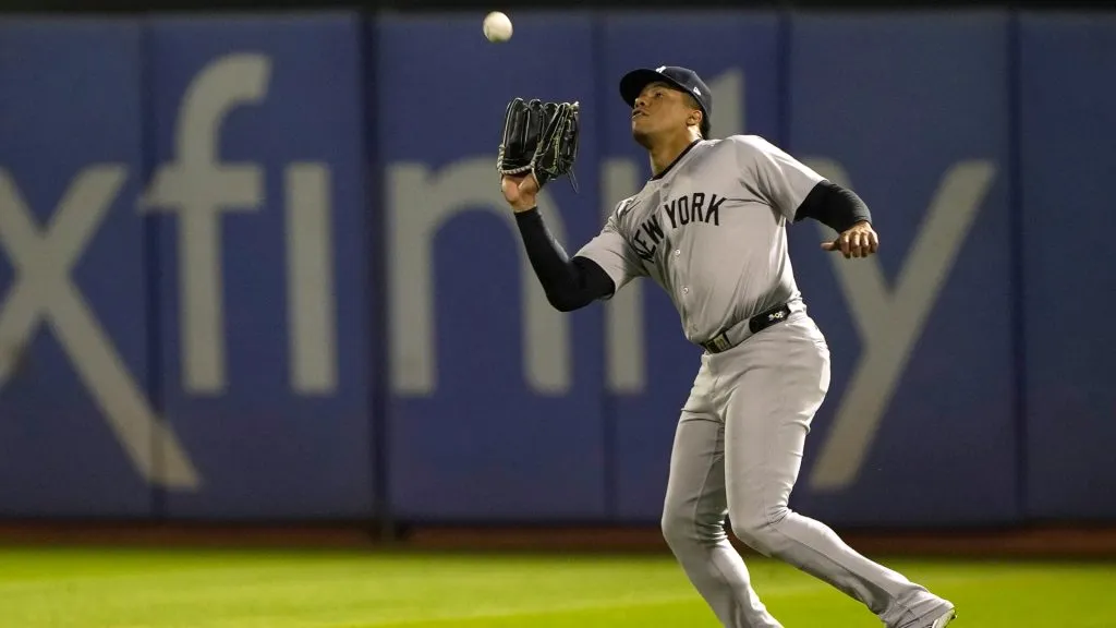 Juan Soto #22 of the New York Yankees catches a fly ball hit by Brent Rooker #25 of the Oakland Athletics in the bottom of the ninth inning at the Oakland Coliseum on September 21, 2024 in Oakland, California. the Yankees won the game 10-0. (Photo by Thearon W. Henderson/Getty Images)