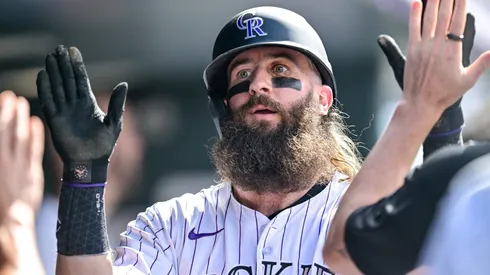 Charlie Blackmon #19 of the Colorado Rockies celebrates his eighth inning run against the Atlanta Braves at Coors Field.