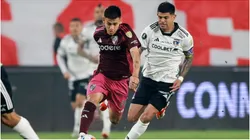 Colo Colo's player Esteban Pavez, vies the ball against Claudio Echeverri of River Plate