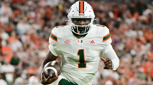 Cam Ward #1 of the Miami Hurricanes rushes the ball in the third quarter of a game against the South Florida Bulls at Raymond James Stadium on September 21, 2024 in Tampa, Florida.