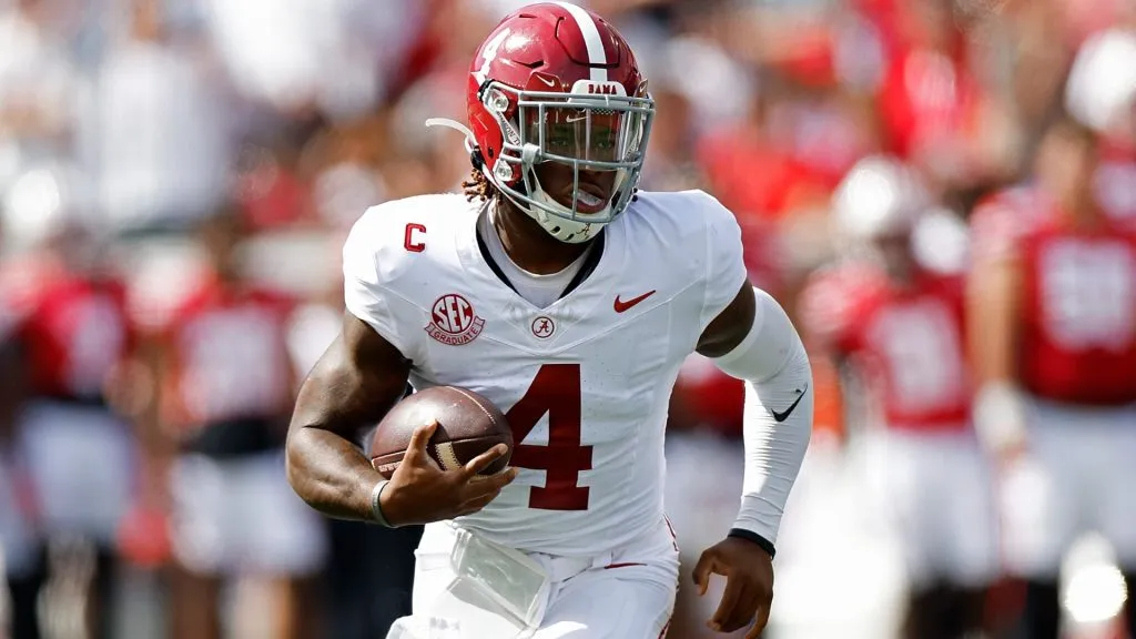 Jalen Milroe #4 of the Alabama Crimson Tide rushes the ball in the first quarter against the Wisconsin Badgers at Camp Randall Stadium on September 14, 2024 in Madison, Wisconsin.