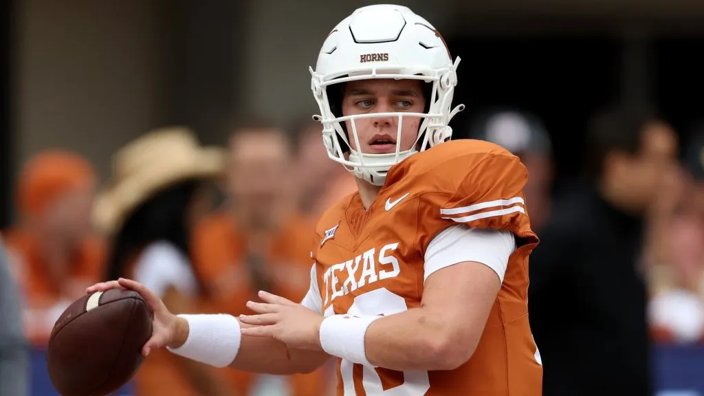 Arch Manning #16 of the Texas Longhorns warms up before the game against the Kansas State Wildcats at Darrell K Royal-Texas Memorial Stadium on November 04, 2023 in Austin, Texas.