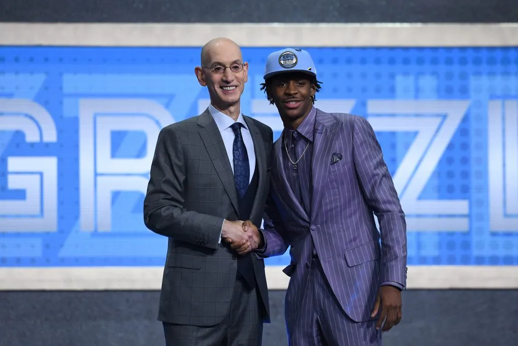 Ja Morant poses with NBA Commissioner Adam Silver after being drafted with the second overall pick by the Memphis Grizzlies. Sarah Stier/Getty Images