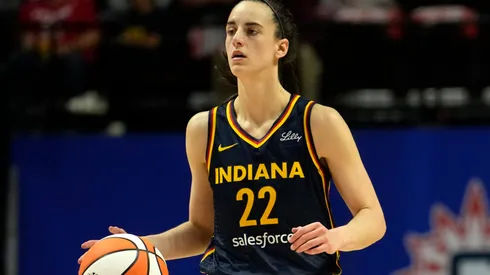 Caitlin Clark #22 of the Indiana Fever advances the ball during the second half of a first-round WNBA playoff game against the Connecticut Sun at Mohegan Sun Arena on September 22, 2024 in Uncasville, Connecticut. The Sun defeated the Fever 93-69.