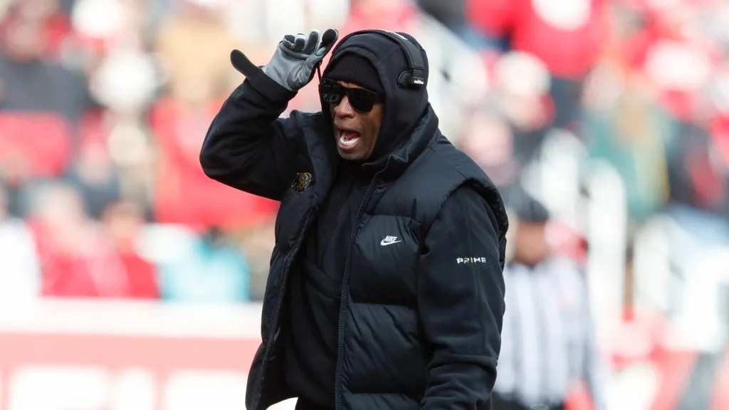 Deion Sanders head coach of the Colorado Buffaloes calls a play during the first half of their game aginast the Utah Utes at Rice Eccles Stadium on November 25, 2023 in Salt Lake City, Utah.