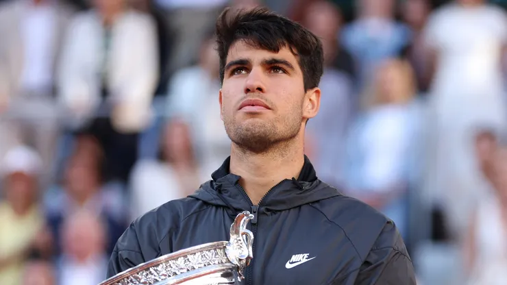 Carlos Alcaraz celebrates after victory against Alexander Zverev on Day 15 of the 2024 French Open at Roland Garros.