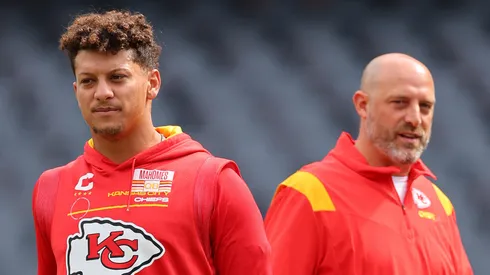 Kansas City Chiefs quarterback Patrick Mahomes and offensive coordinator Matt Nagy look on prior to a preseason game against the Chicago Bears at Soldier Field on August 13, 2022 in Chicago, Illinois.