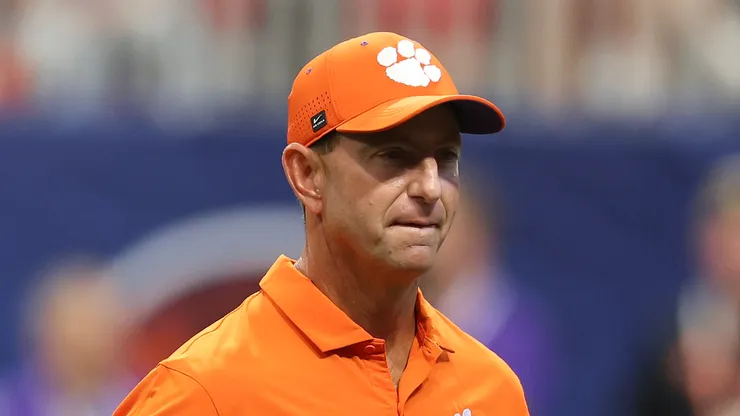 Clemson Tigers head coach Dabo Swinney walks on the field during pre-game warmups before the Aflac Kickoff Game against the Georgia Bulldogs at Mercedes Benz Stadium on August 31, 2024 in Atlanta, Georgia.