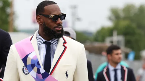 LeBron James, Flagbearer of Team United States looks on prior to the opening ceremony of the Olympic Games Paris 2024