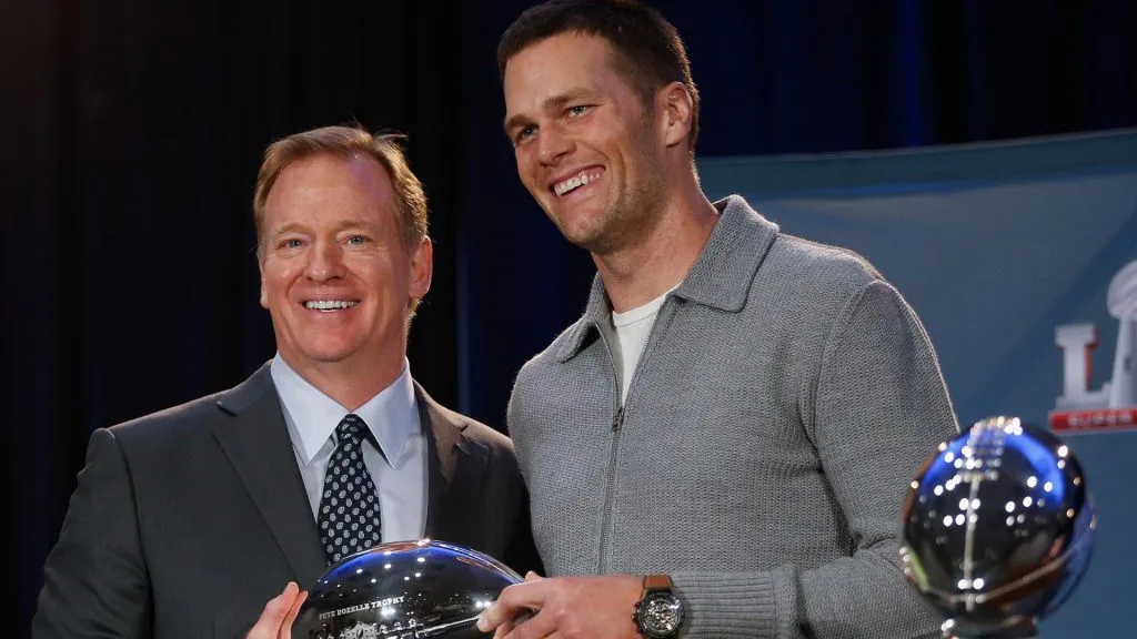 NFL Commissioner Roger Goodell, left, and New England Patriots' Tom Brady with the Pete Rozelle MVP Trophy during the Super Bowl Winner and MVP press conference on February 6, 2017 in Houston, Texas.