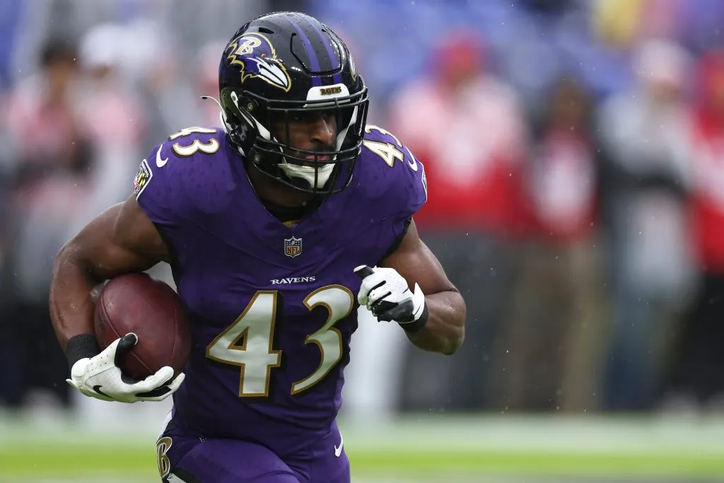 BALTIMORE, MARYLAND – DECEMBER 10: Justice Hill #43 of the Baltimore Ravens warms up prior to the game against the Los Angeles Rams at M&amp;T Bank Stadium on December 10, 2023 in Baltimore, Maryland. (Photo by Todd Olszewski/Getty Images)