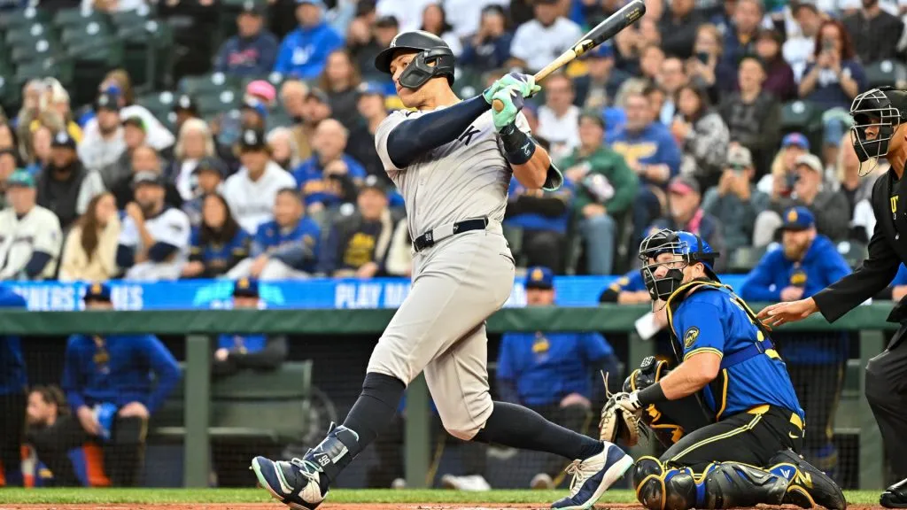 Aaron Judge #99 of the New York Yankees hits a two-run RBI double during the first inning against the Seattle Mariners at T-Mobile Park. (Photo by Alika Jenner/Getty Images)