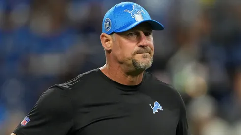 Head coach Dan Campbell looks on during warmups prior to their game against the Los Angeles Rams at Ford Field on September 08, 2024 in Detroit, Michigan