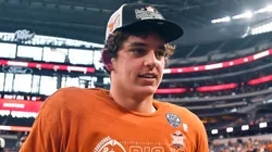Texas Longhorns quarterback Arch Manning walks off the field after the Big 12 Conference Championship NCAA, College League, USA college football game against the Oklahoma State Cowboys at AT&T Stadium in Arlington, TX