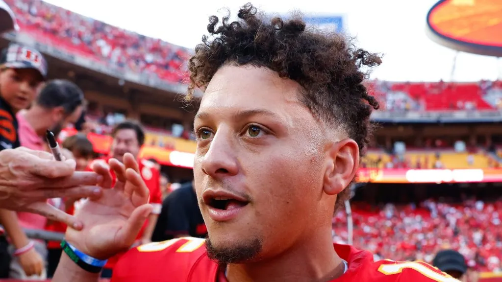 Patrick Mahomes #15 of the Kansas City Chiefs celebrates with fans after defeating the Cincinnati Bengals at GEHA Field at Arrowhead Stadium on September 15, 2024 in Kansas City, Missouri.