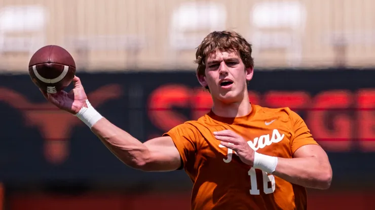 Arch Manning 16 of the Texas Longhorns warming up before their game vs the Rice Owls at DKR-Memorial Stadium