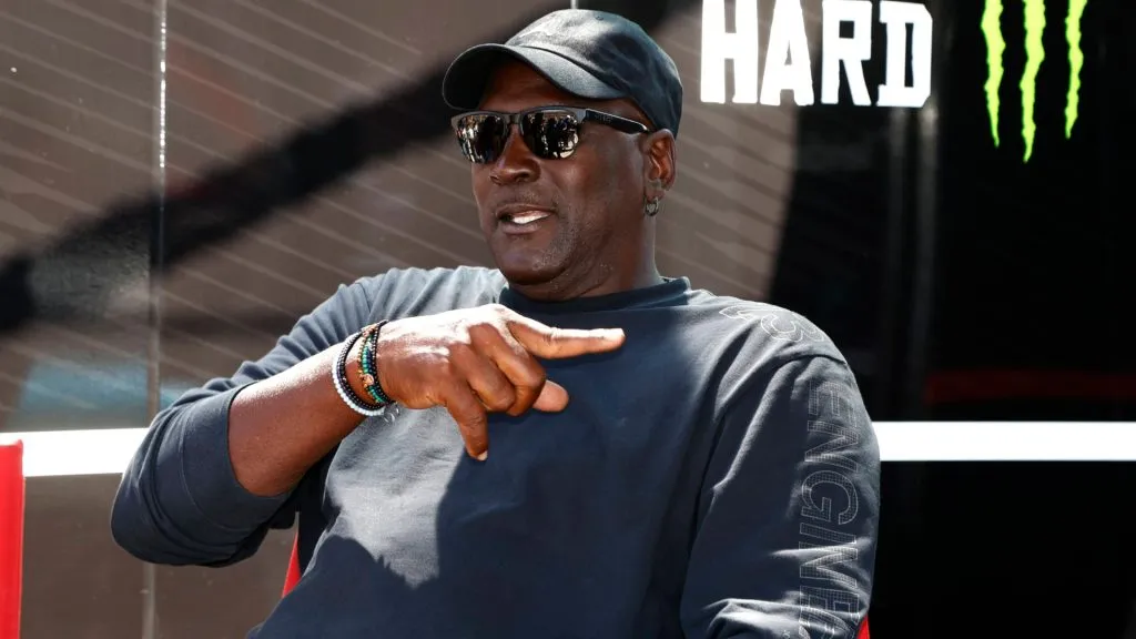 23xi co-owner Michael Jordan talks with members of his team prior to the running of the NASCAR, Motorsport, USA Cup Series Quaker State 400. IMAGO /&nbsp;Icon Sportswire.