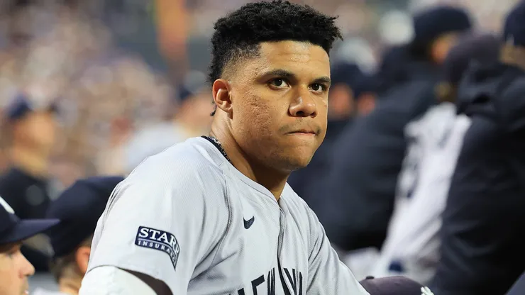 Juan Soto 22 of the New York Yankees is watching the action from the dugout during the sixth inning of the baseball game against the New York Mets.