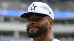 Dak Prescott #4 of the Dallas Cowboys smiles.