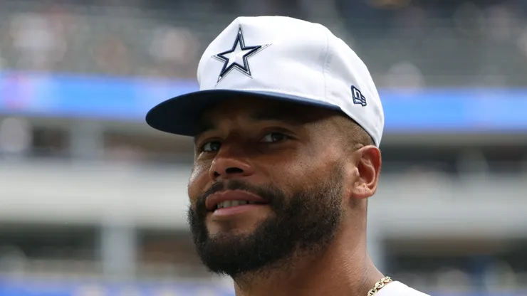 Dak Prescott #4 of the Dallas Cowboys smiles.