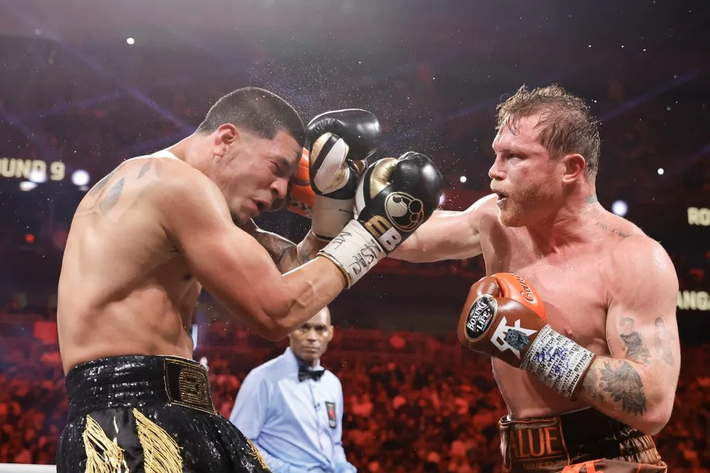 LAS VEGAS, NEVADA ā SEPTEMBER 14: WBC/WBA/WBO super middleweight champion Canelo Alvarez (R) punches Edgar Berlanga during the ninth round of a title fight at T-Mobile Arena on September 14, 2024 in Las Vegas, Nevada. (Photo by Steve Marcus/Getty Images)