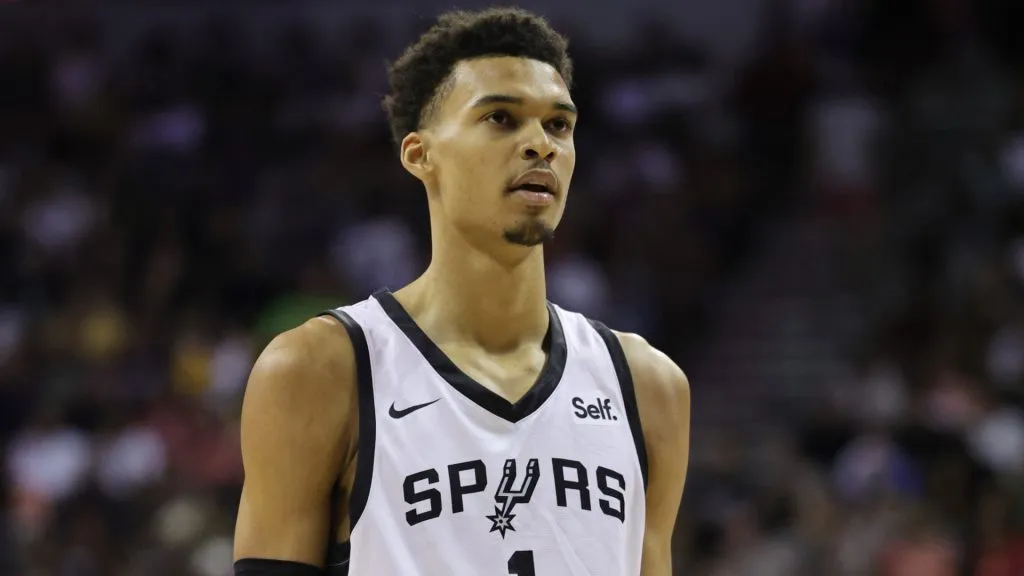 Victor Wembanyama #1 of the San Antonio Spurs attempts a free throw during the first quarter against the Charlotte Hornets