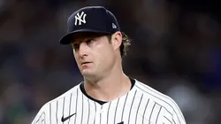 Gerrit Cole #45 of the New York Yankees reacts on the mound after giving up a walk to Francisco Alvarez of the New York Mets in the sixth inning at Yankee Stadium on July 24, 2024 in New York City.