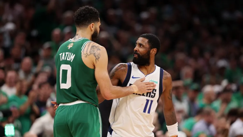 Kyrie Irving of the Dallas Mavericks and Jayson Tatum of the Boston Celtics in Game Five of the 2024 NBA Finals (Photo by Elsa/Getty Images)