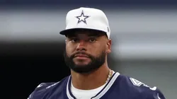 Dak Prescott #4 of the Dallas Cowboys looks on from the sideline during the first half of a preseason game against the Los Angeles Chargers at AT&T Stadium on August 24, 2024 in Arlington, Texas.