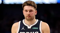 Luka Doncic #77 of the Dallas Mavericks walks down the court in the first half against the Los Angeles Lakers