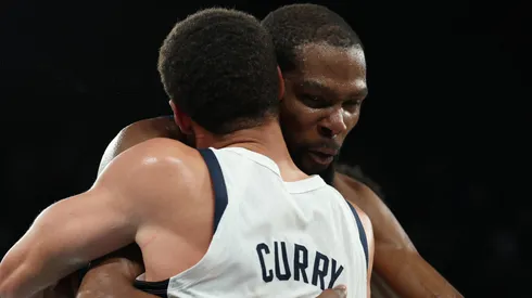 Kevin Durant #7 and Stephen Curry #4 of Team United States react after winning against Team Serbia during a Men's basketball semifinals match between Team United States and Team Serbia on day thirteen of the Olympic Games Paris 2024 at Bercy Arena on August 08, 2024 in Paris, France.