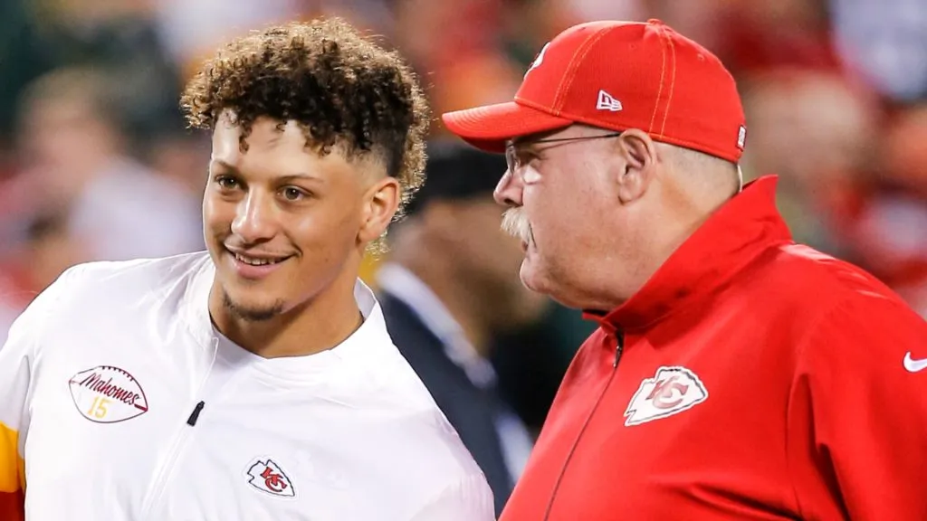 Patrick Mahomes #15 of the Kansas City Chiefs speaks to head coach Andy Reid of the Kansas City Chiefs prior to the game against the Green Bay Packers at Arrowhead Stadium on October 27, 2019 in Kansas City, Missouri.