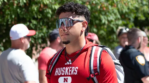 Dylan Raiola #15 of the Nebraska Cornhuskers leads the team to the stadium before the game against the UTEP Miners at Memorial Stadium on August 31, 2024 in Lincoln, Nebraska.
