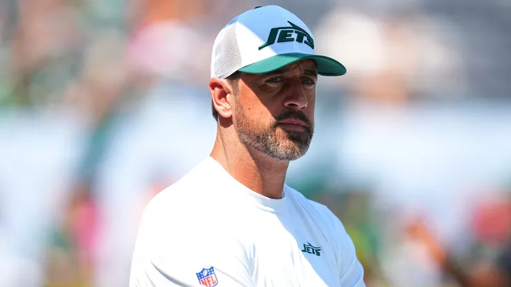 Aaron Rodgers of the New York Jets looks on prior to the preseason game against the Washington Commanders at MetLife Stadium on August 10, 2024 in East Rutherford, New Jersey