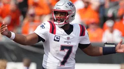 Jacoby Brissett #7 of the New England Patriots gestures to his team in the second half of the game against the Cincinnati Bengals at Paycor Stadium on September 08, 2024 in Cincinnati, Ohio.