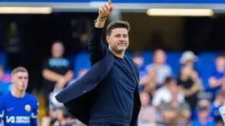 Mauricio Pochettino greets fans during a game