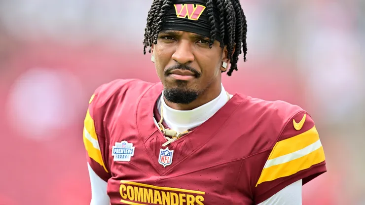 Jayden Daniels #5 of the Washington Commanders looks on prior to a game against the Tampa Bay Buccaneers at Raymond James Stadium on September 08, 2024 in Tampa, Florida.